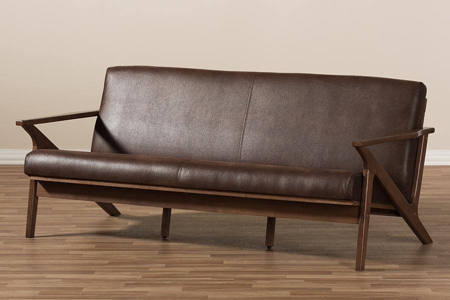 Baxton Studio Bianca Mid-Century Modern Walnut Wood Dark Brown Distressed Faux Leather 3-Seater Sofa