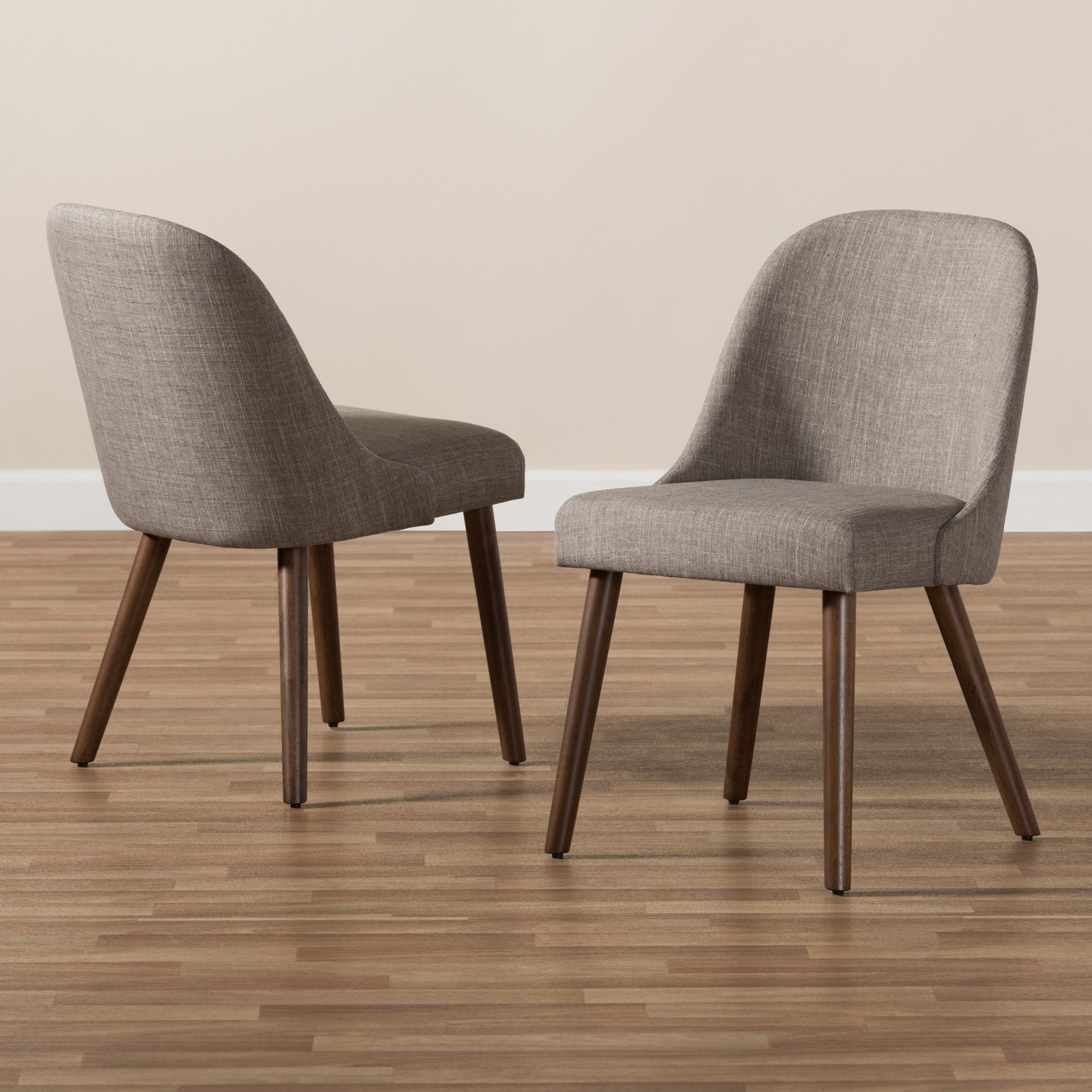 Baxton Studio Cody Mid-Century Modern Light Grey Fabric Upholstered Walnut Finished Wood Dining Chair (Set of 2)