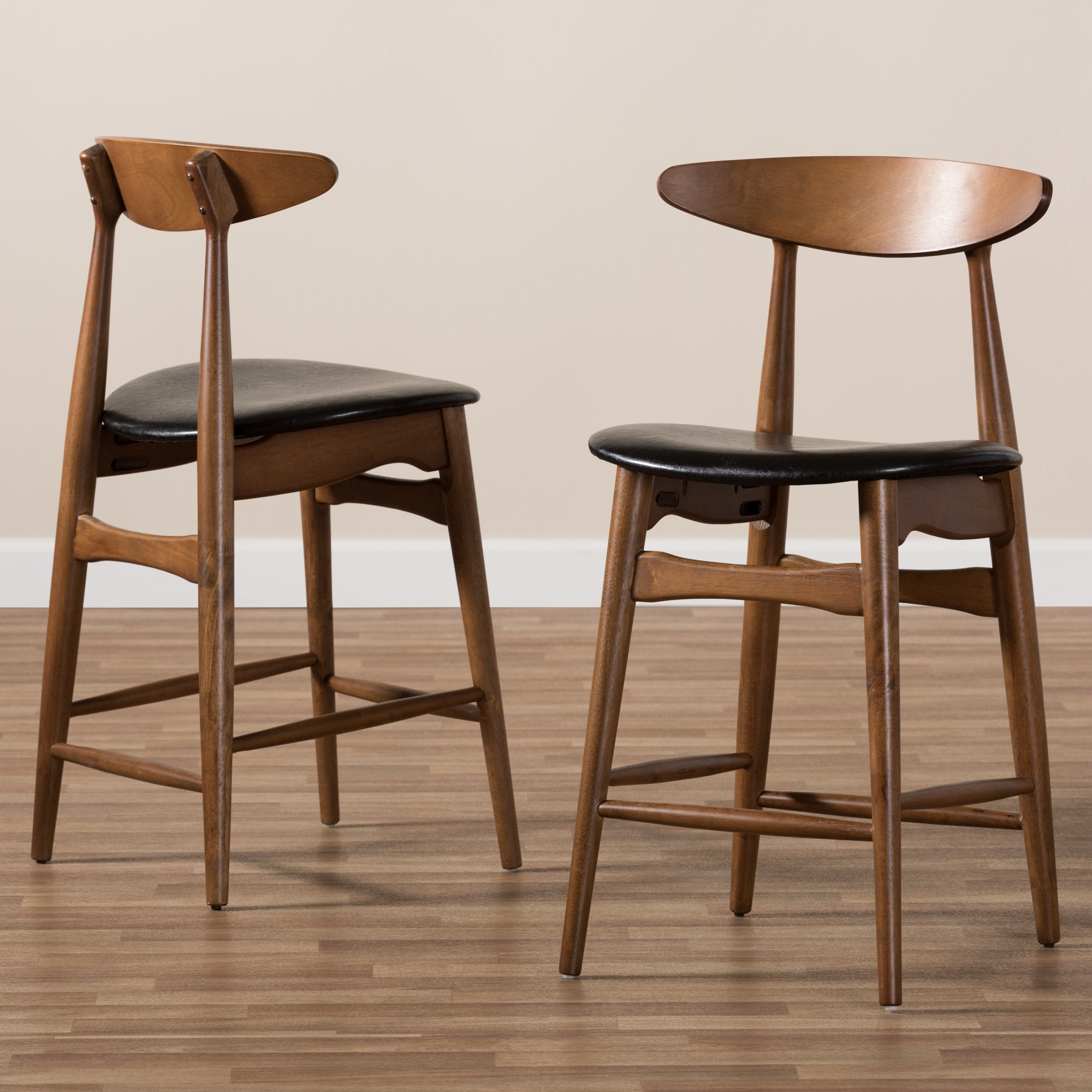 Baxton Studio Flora Mid-Century Modern Black Faux Leather Upholstered Walnut Finished Counter Stool (Set of 2)